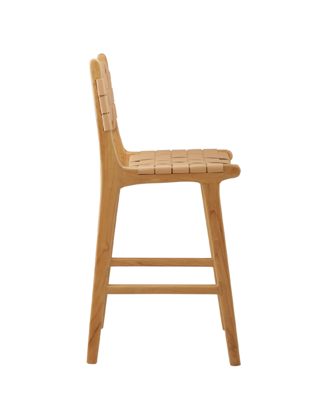 Side View. A wooden counter stool with a woven tan leather seat and back, shown against a transparent background.