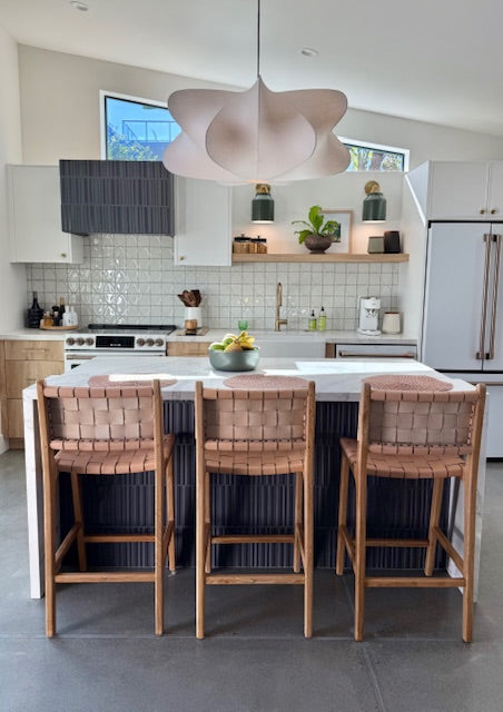 Kid Friendly Leather Counter Stools at a Modern White Kitchen Island