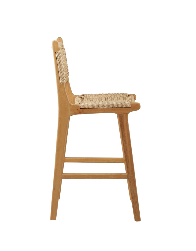 counter stool with a woven rattan seat and backrest. The backrest is woven in a diagonal pattern, creating a more textured, crisscross appearance. The seat features a similar woven style, with a smooth and rounded shape for added comfort. side view