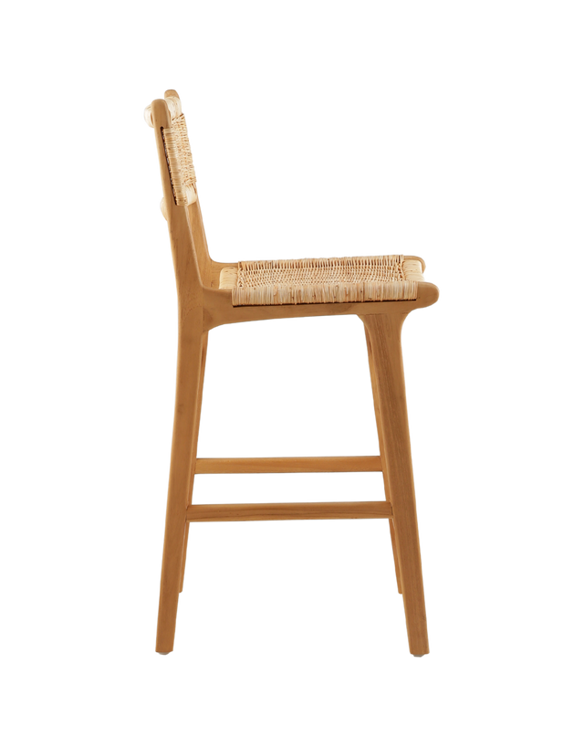 Side View. A wooden counter stool featuring a woven rattan seat and back, shown against a transparent background