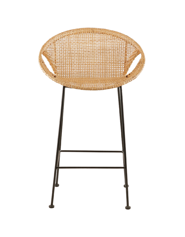 stylish counter stool with a round, woven rattan seat. The seat is supported by slim black metal legs, offering a modern contrast to the natural texture of the rattan. The design features small cut-out sections at the sides of the seat, adding a distinctive and contemporary touch to the overall look.