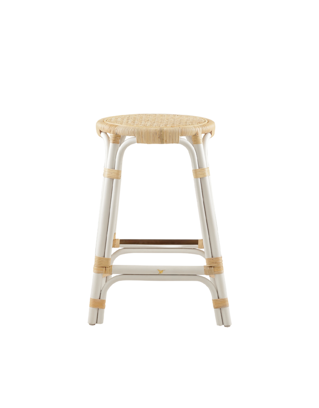 A rattan counter stool with a round woven seat and white frame accented with natural rattan bindings, shown against a transparent background.