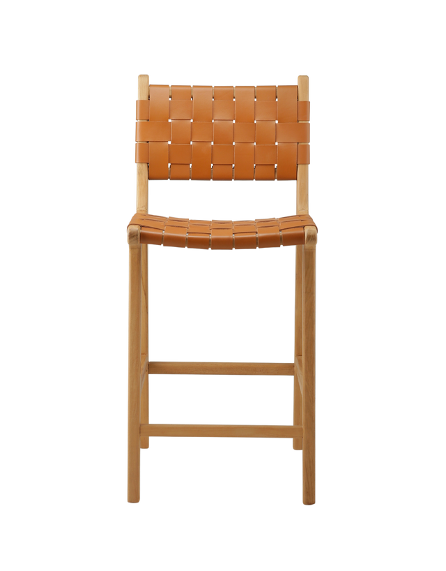 modern counter stool with a woven leather seat and backrest. The seat and backrest are made from interlaced tan leather strips, offering a stylish and comfortable design. The stool has a simple wooden frame with straight legs and a crossbar for added stability, combining contemporary and rustic elements.