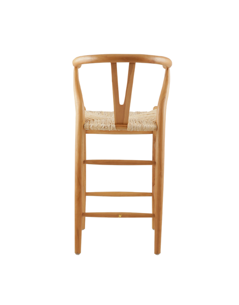 counter stool made from teak wood with a woven seat. The stool features a classic design with a curved backrest and straight legs. The natural wood finish highlights the rich grain of the teak, giving it a timeless, rustic charm. Back view