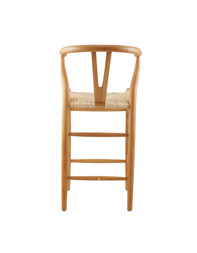 counter stool made from teak wood with a woven seat. The stool features a classic design with a curved backrest and straight legs. The natural wood finish highlights the rich grain of the teak, giving it a timeless, rustic charm. Back view